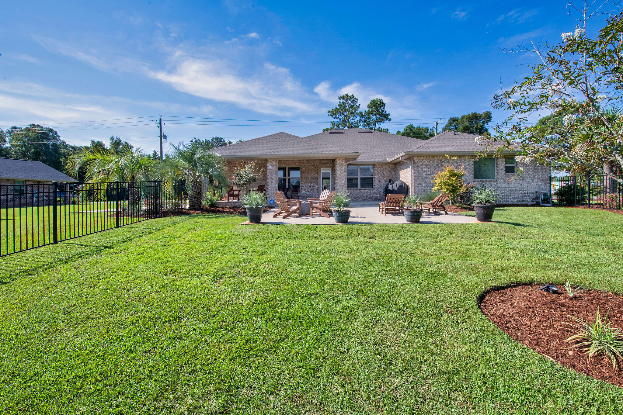 5392 South A Jones Road Milton, FL 32583 - Photo 11 of 55 a view of a house with a yard and sitting area
