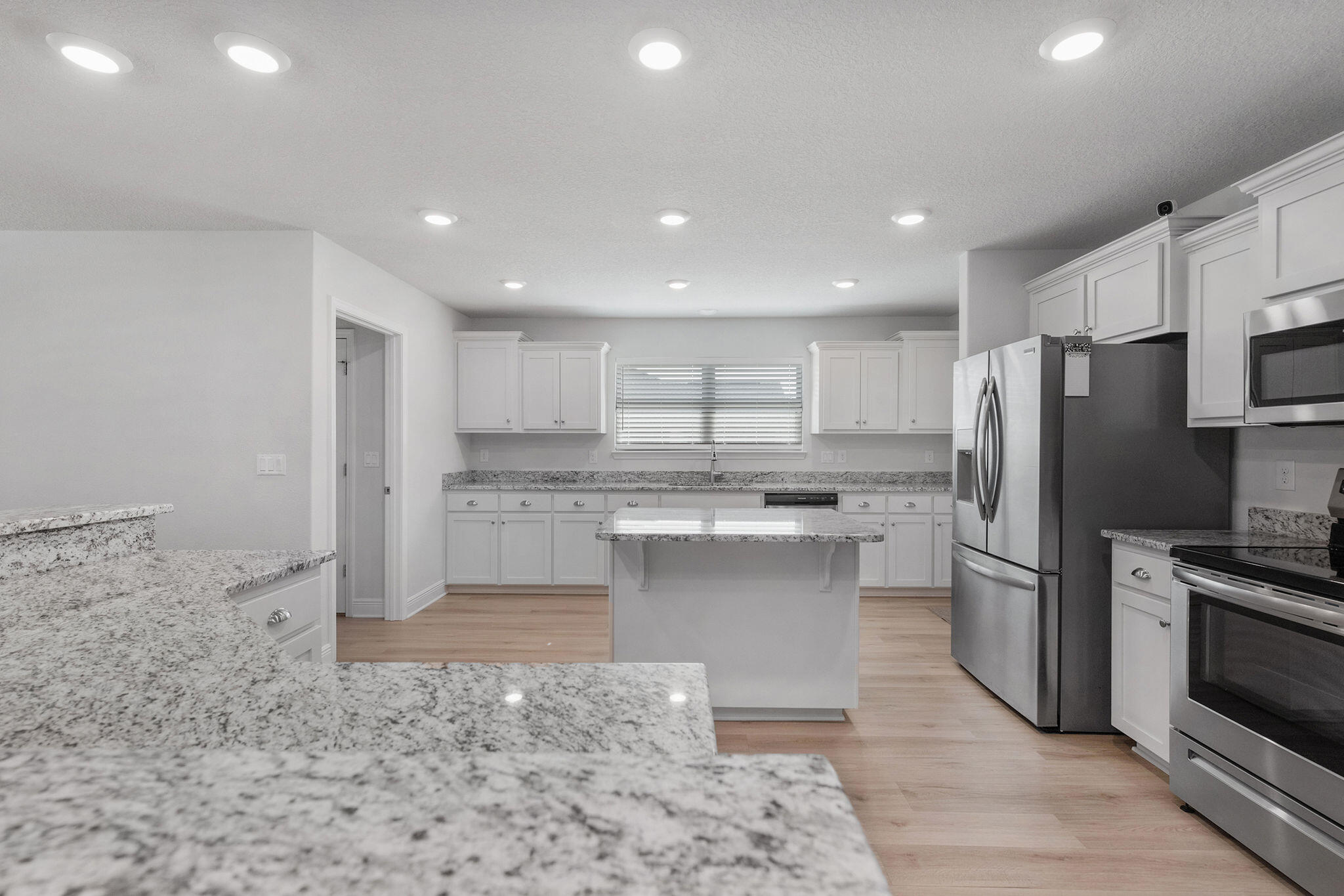 5392 South A Jones Road Milton, FL 32583 - Photo 27 of 55 a kitchen with a refrigerator sink and stove