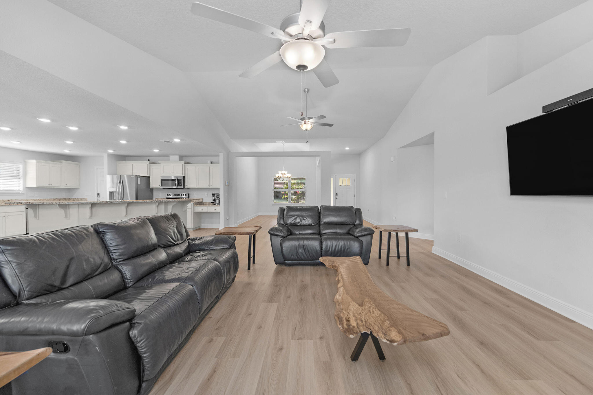 5392 South A Jones Road Milton, FL 32583 - Photo 33 of 55 a living room with furniture and a flat screen tv