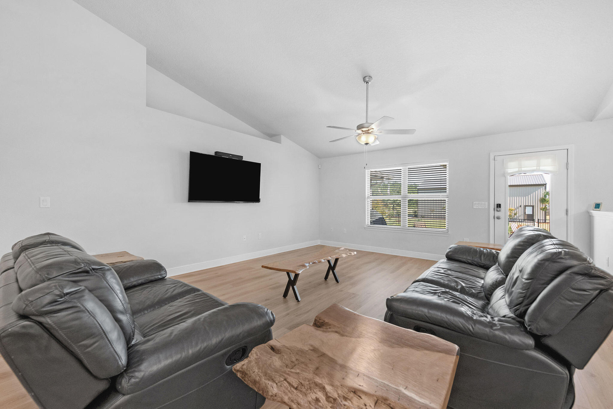 5392 South A Jones Road Milton, FL 32583 - Photo 35 of 55 a living room with furniture and a flat screen tv