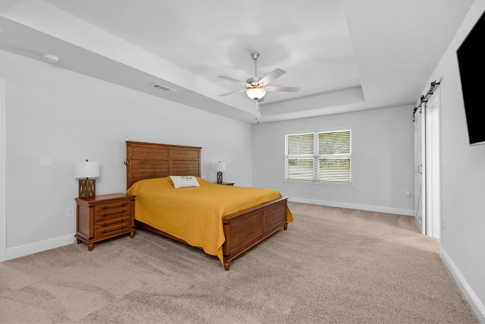 5392 South A Jones Road Milton, FL 32583 - Photo 37 of 55 a bedroom with a bed and a window