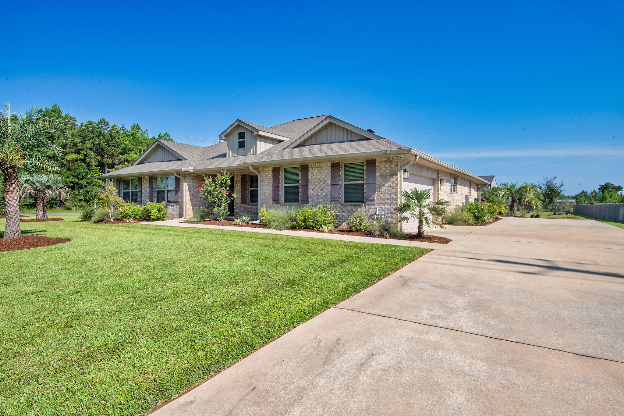 5392 South A Jones Road Milton, FL 32583 - Photo 4 of 55 a front view of a house with a yard