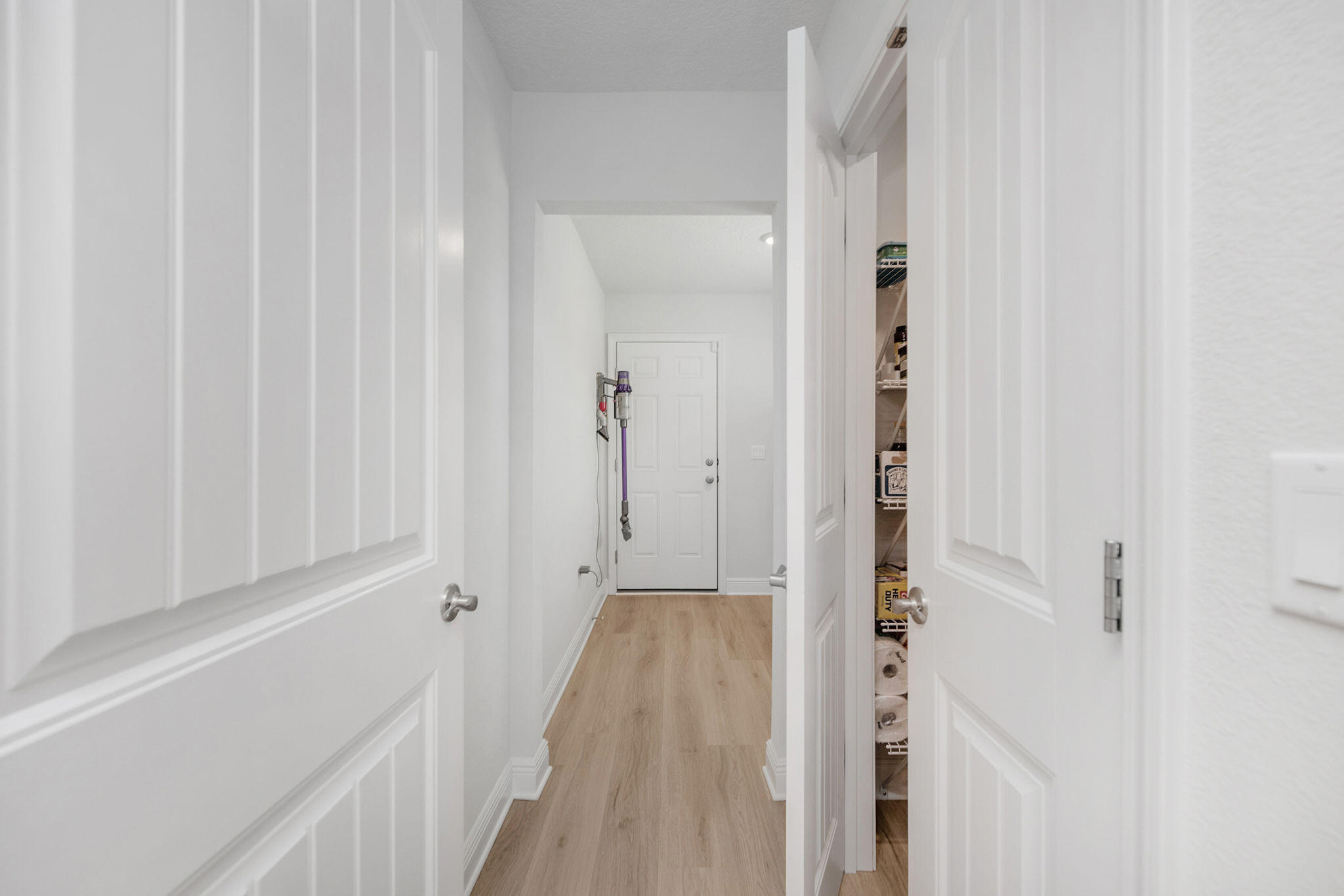 5392 South A Jones Road Milton, FL 32583 - Photo 43 of 55 a view of a hallway with wooden floor and a shower