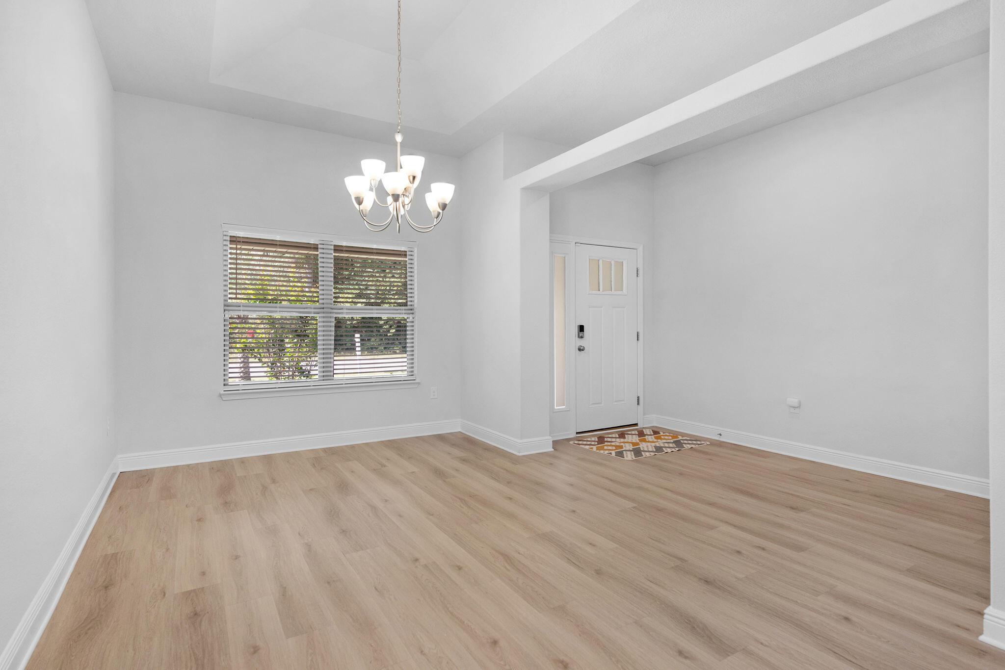 5392 South A Jones Road Milton, FL 32583 - Photo 45 of 55 wooden floor in an empty room with a window