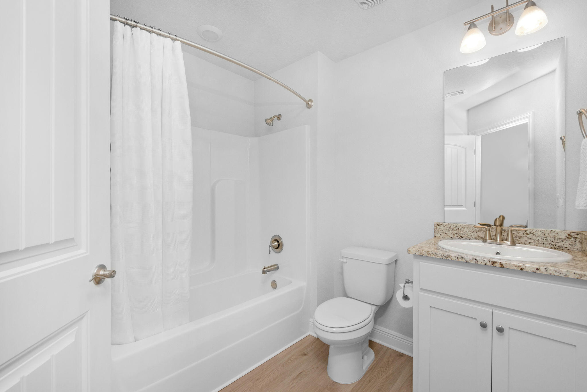 5392 South A Jones Road Milton, FL 32583 - Photo 48 of 55 a bathroom with a toilet a sink and a bathtub