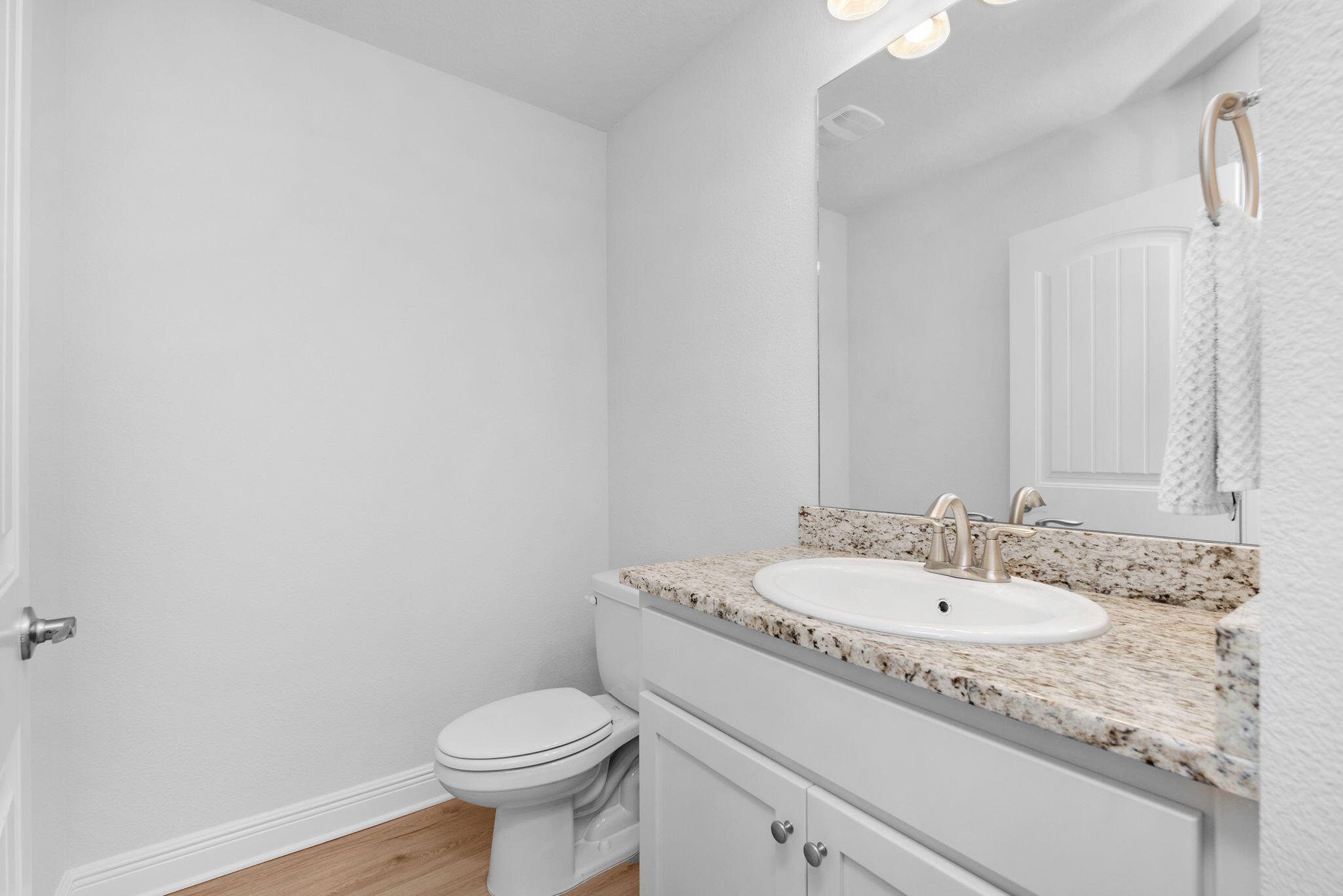5392 South A Jones Road Milton, FL 32583 - Photo 50 of 55 a bathroom with a granite countertop sink a toilet and a mirror