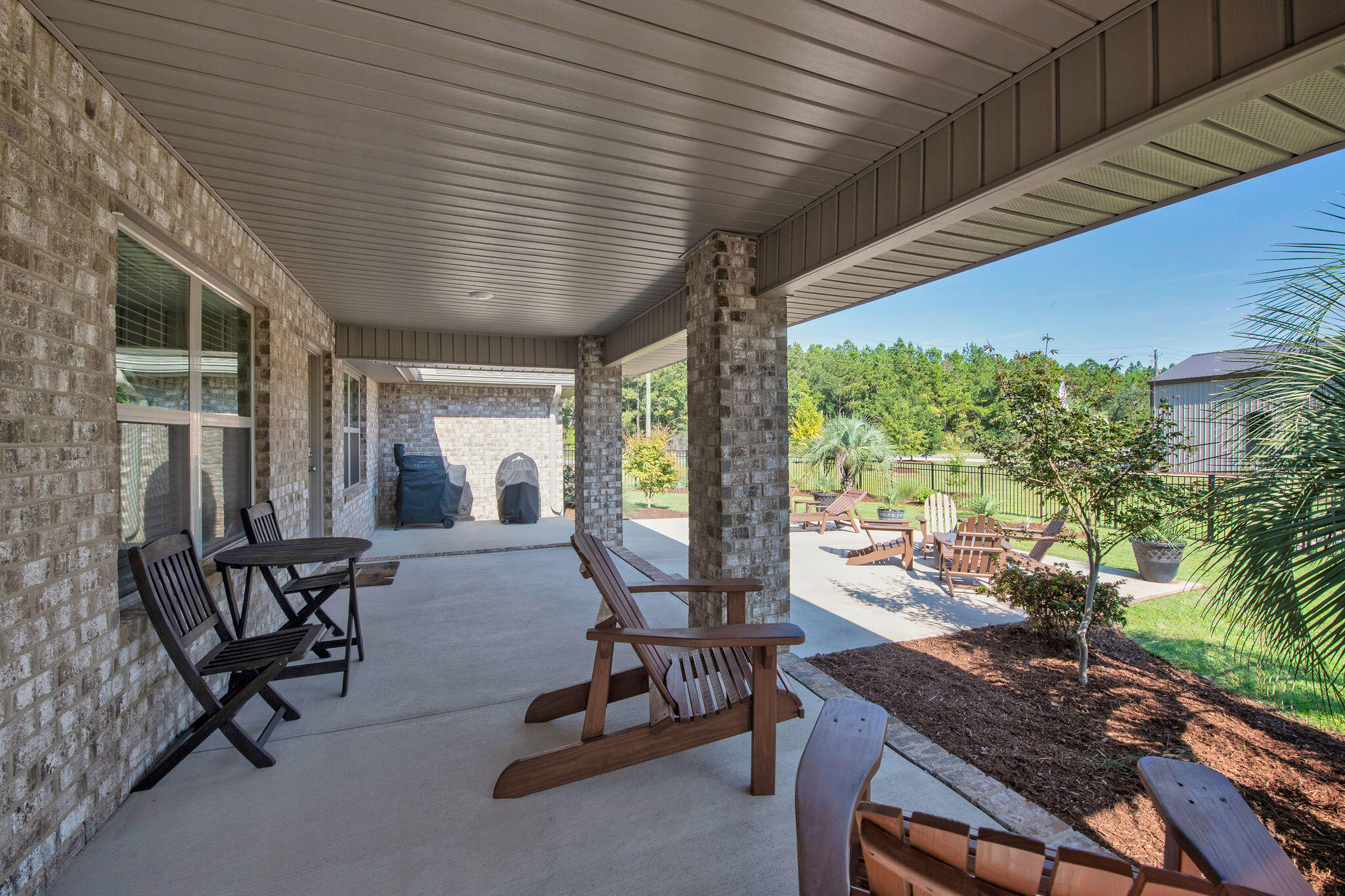 5392 South A Jones Road Milton, FL 32583 - Photo 9 of 55 a view of a porch with furniture and a yard