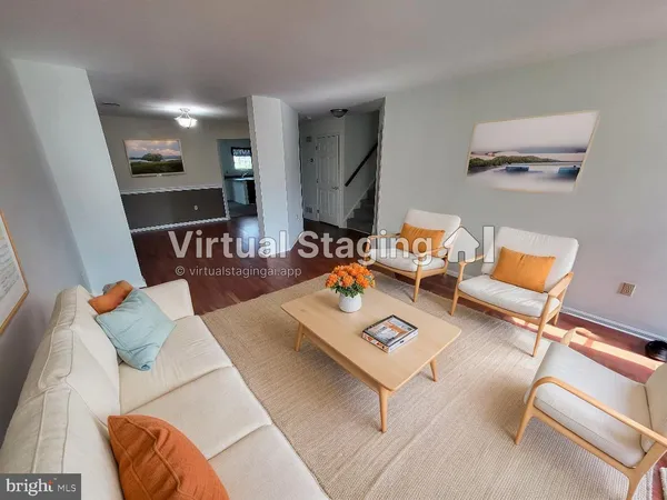 a view of kitchen with stainless steel appliances granite countertop a stove and a refrigerator