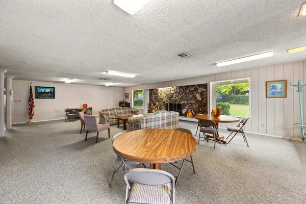 a living room with furniture and a table