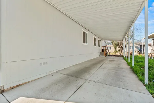 a view of a patio with potted plants