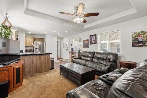 a living room with furniture and a window
