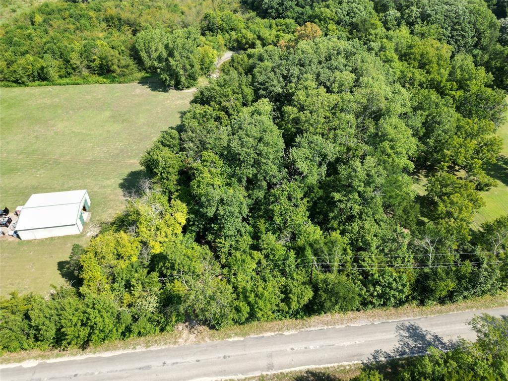 Tbd Bethel-Cannon Road Van Alstyne, TX 75495 - Photo 2 of 25 a view of a lake and a yard