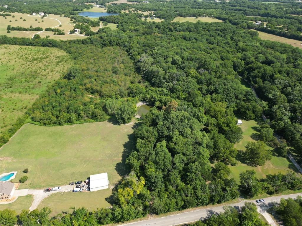 Tbd Bethel-Cannon Road Van Alstyne, TX 75495 - Photo 3 of 25 an aerial view of a residential houses with outdoor space and trees all around