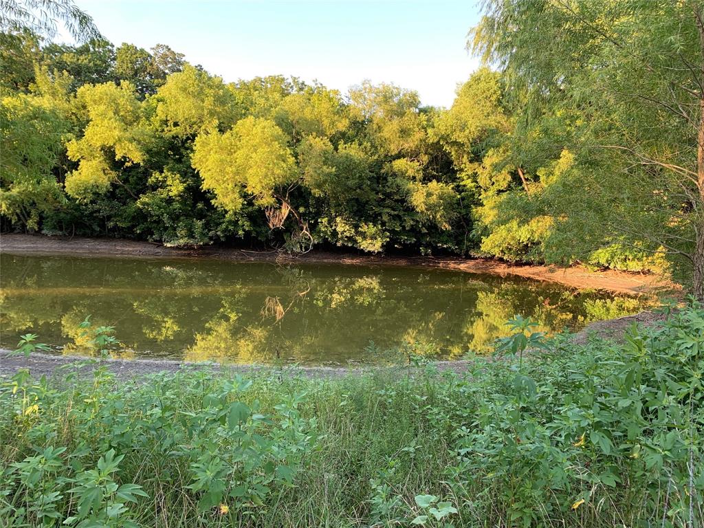 Tbd Bethel-Cannon Road Van Alstyne, TX 75495 - Photo 7 of 25 an aerial view of a houses with yard and lake view