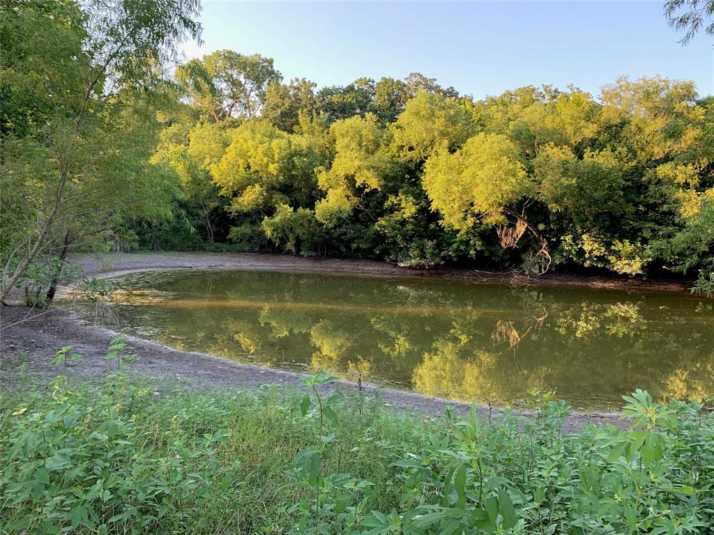 Tbd Bethel-Cannon Road Van Alstyne, TX 75495 - Photo 8 of 25 a view of a lake with houses