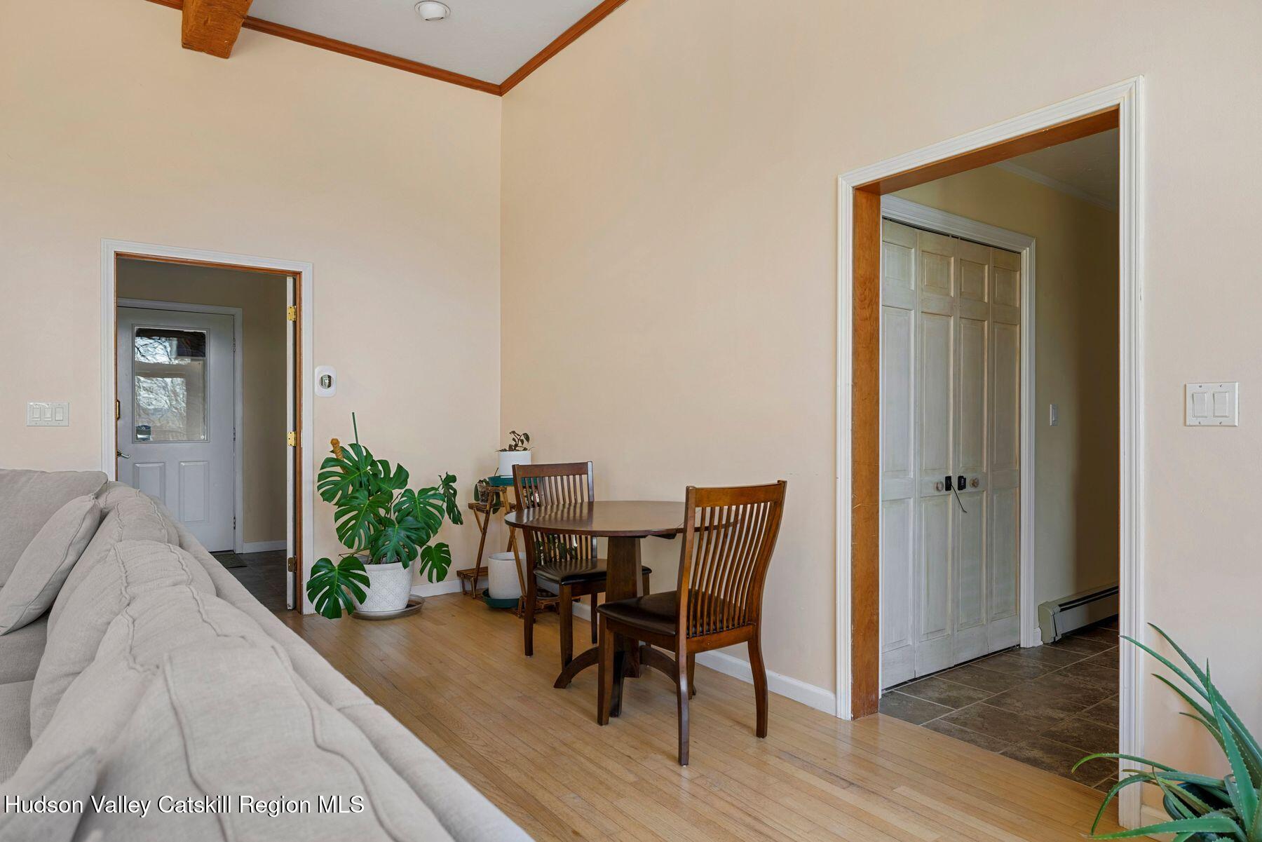 78 Buckskin Loop Windham, NY 12496 - Photo 11 of 97 a view of a room that has a table and chairs in it