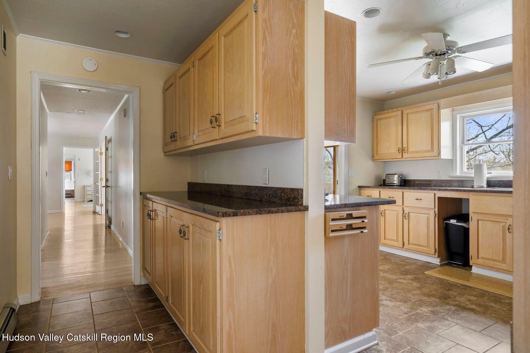 78 Buckskin Loop Windham, NY 12496 - Photo 16 of 97 a kitchen with stainless steel appliances granite countertop a refrigerator and a stove top oven