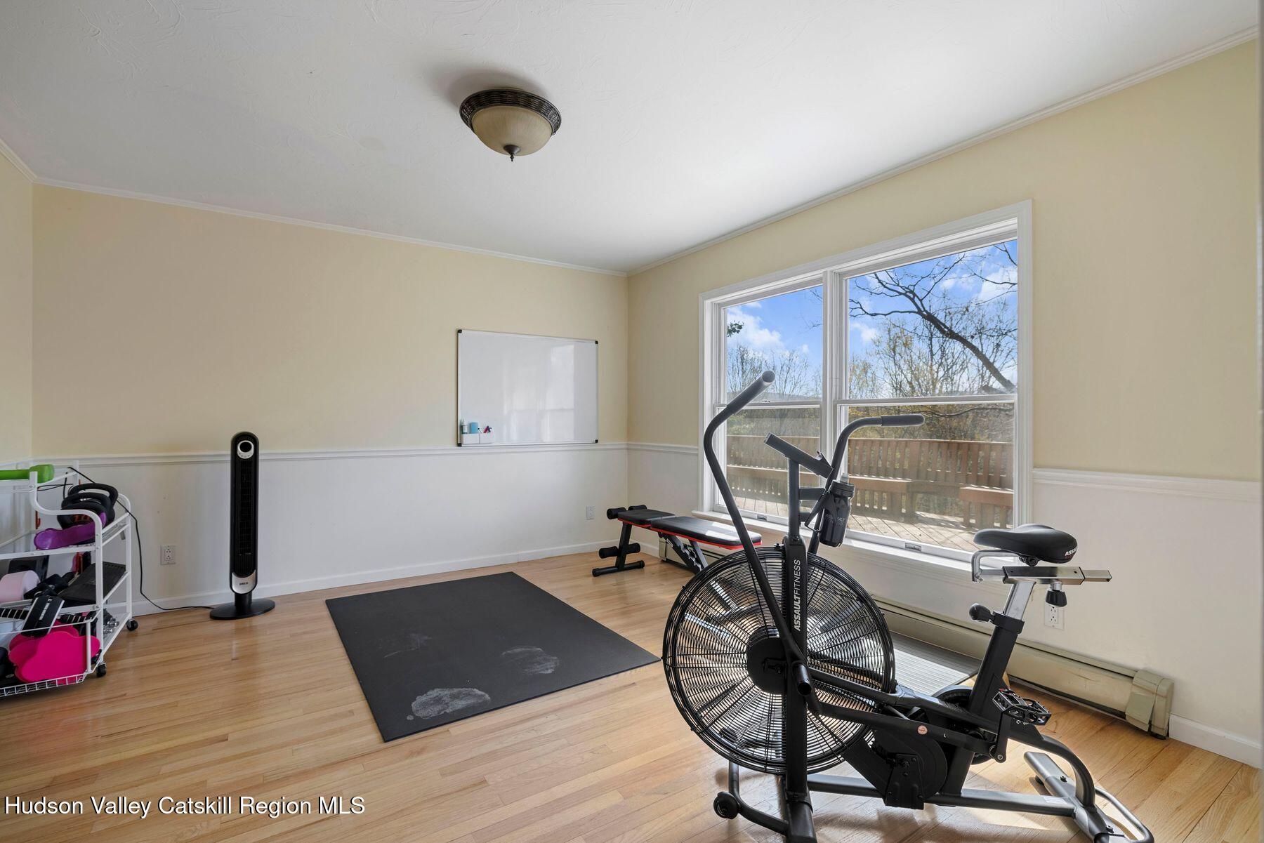 78 Buckskin Loop Windham, NY 12496 - Photo 21 of 97 a view of a room with gym equipment