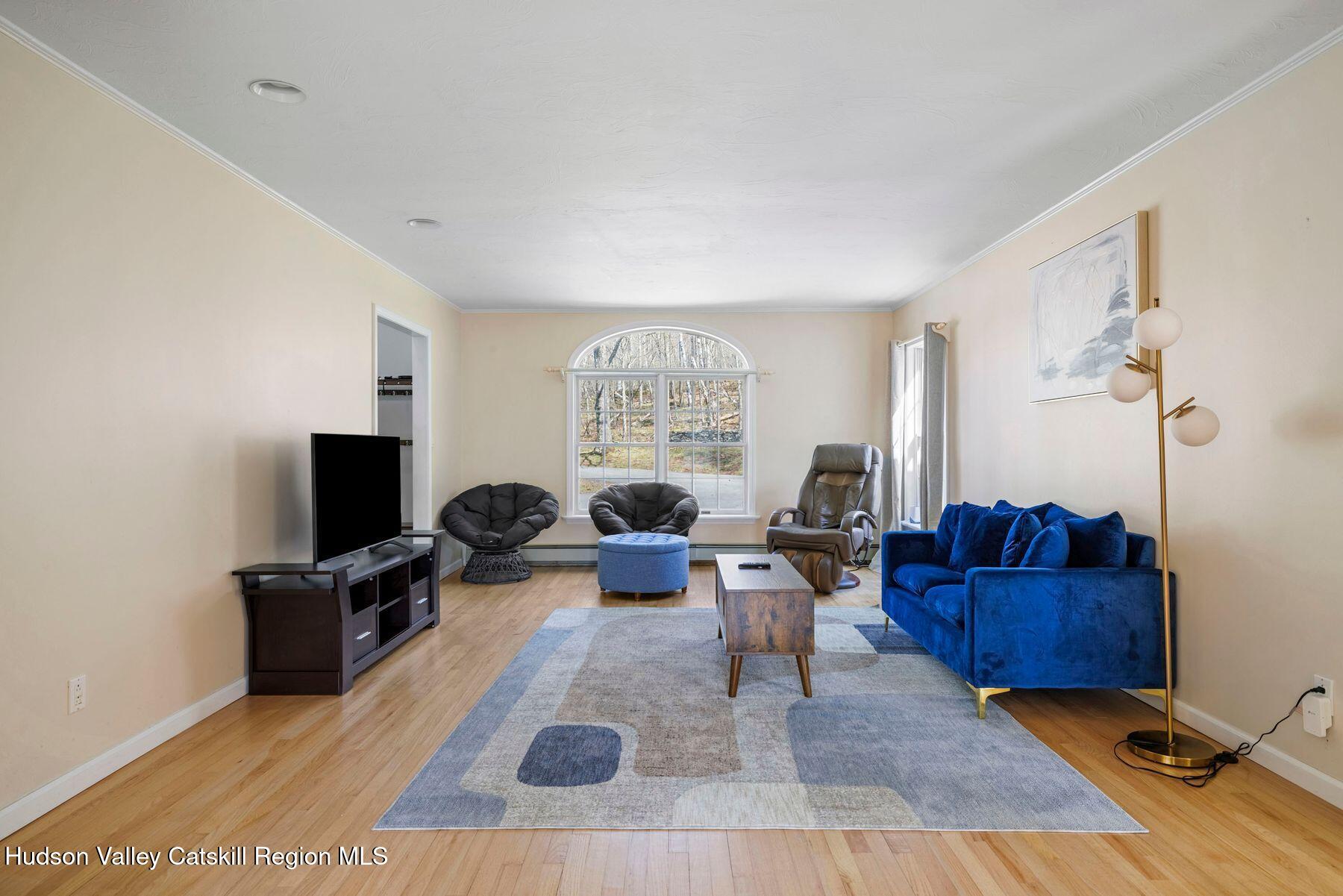 78 Buckskin Loop Windham, NY 12496 - Photo 24 of 97 a living room with furniture and a flat screen tv