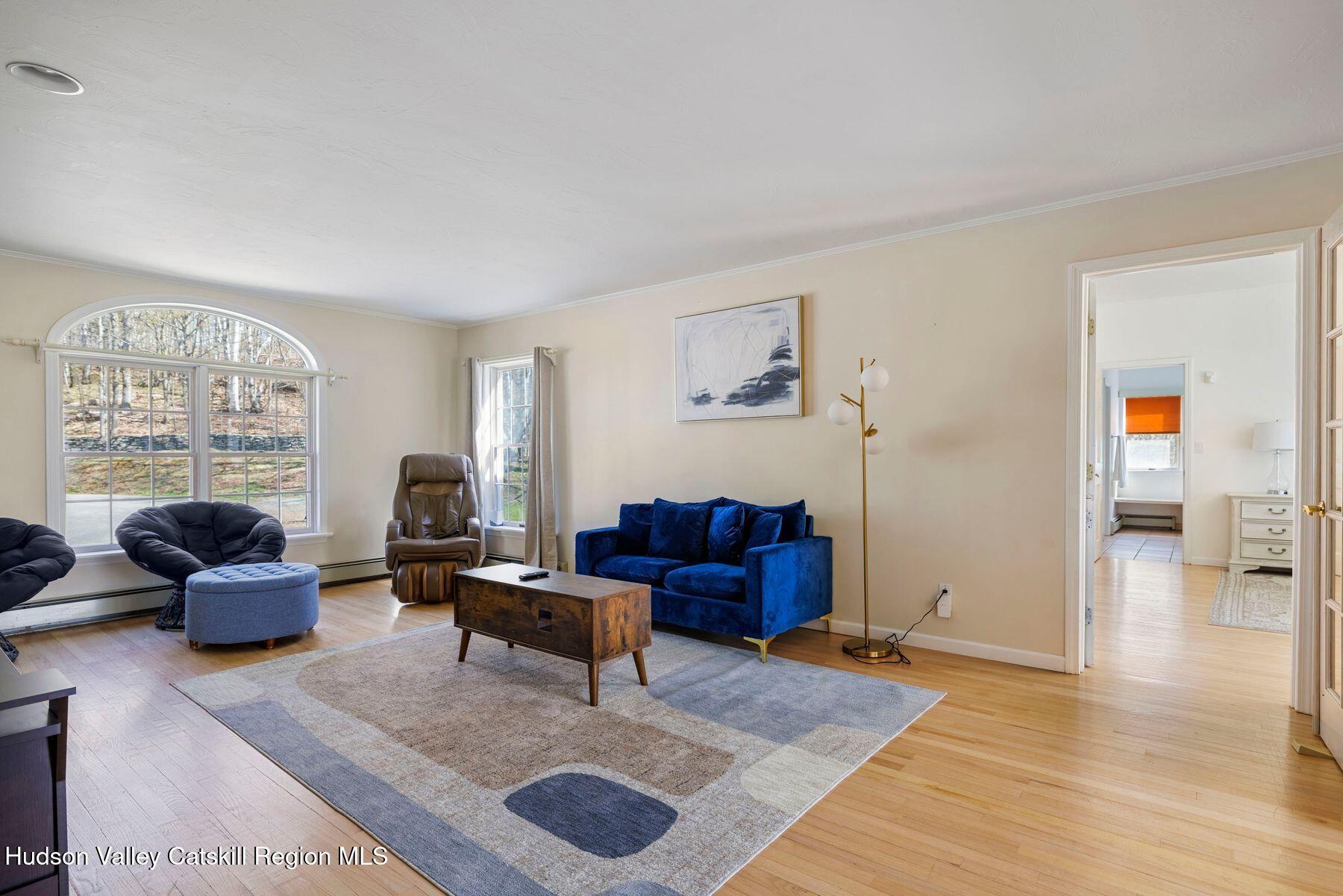 78 Buckskin Loop Windham, NY 12496 - Photo 25 of 97 a living room with furniture and a window