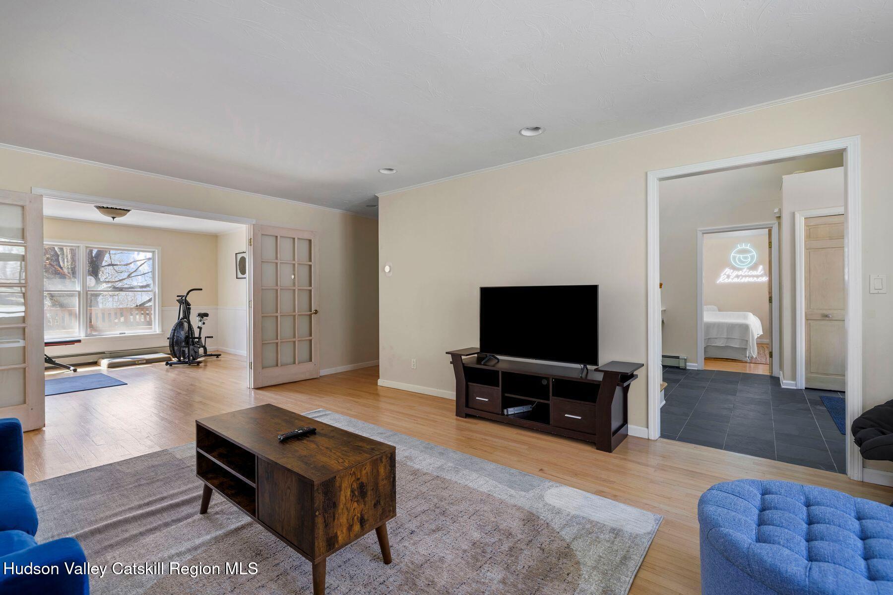 78 Buckskin Loop Windham, NY 12496 - Photo 27 of 97 a living room with furniture and a flat screen tv