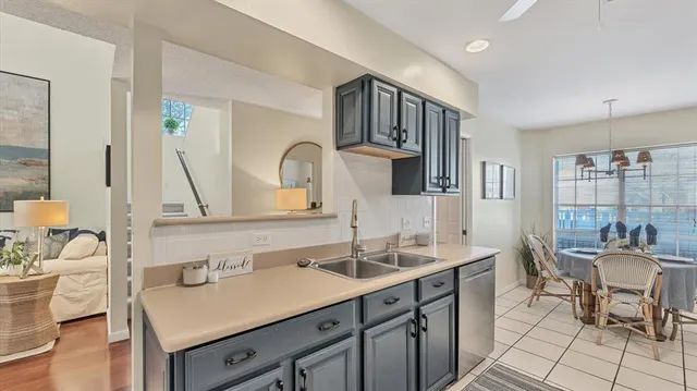 a bathroom with a sink double vanity and a mirror