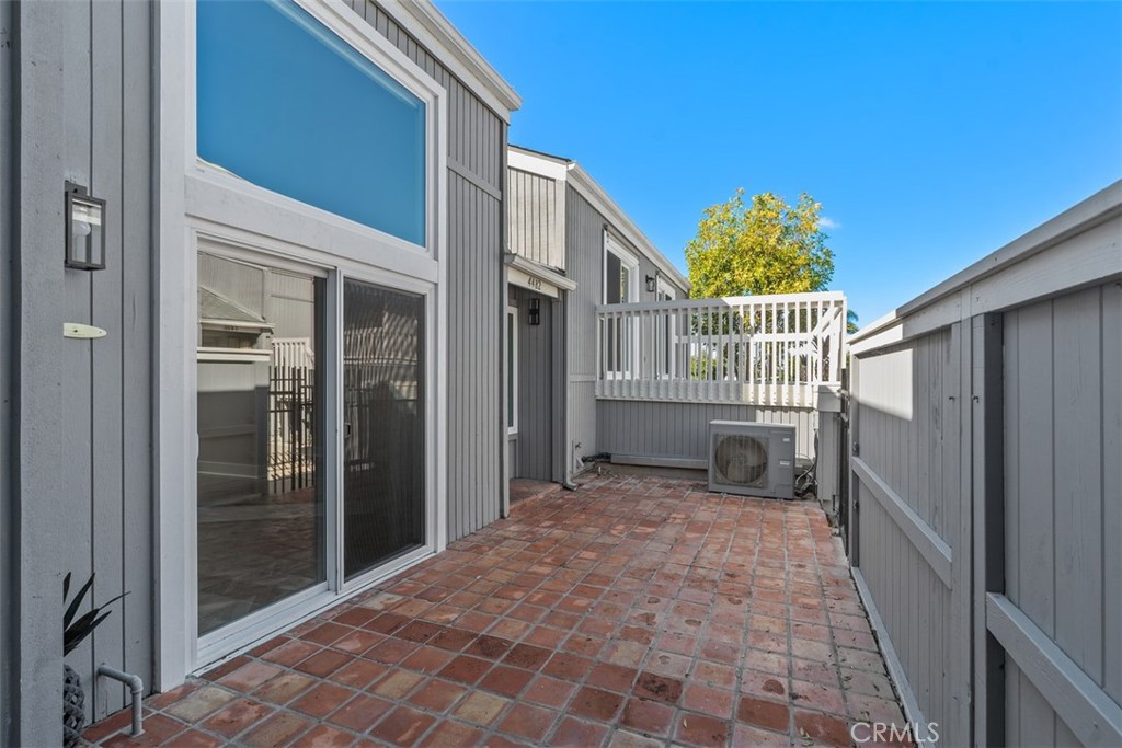 4482 Shorebird Street Huntington Beach, CA 92649 - Photo 2 of 56 Large Patio off of Living Room and Entry (AC Unit)