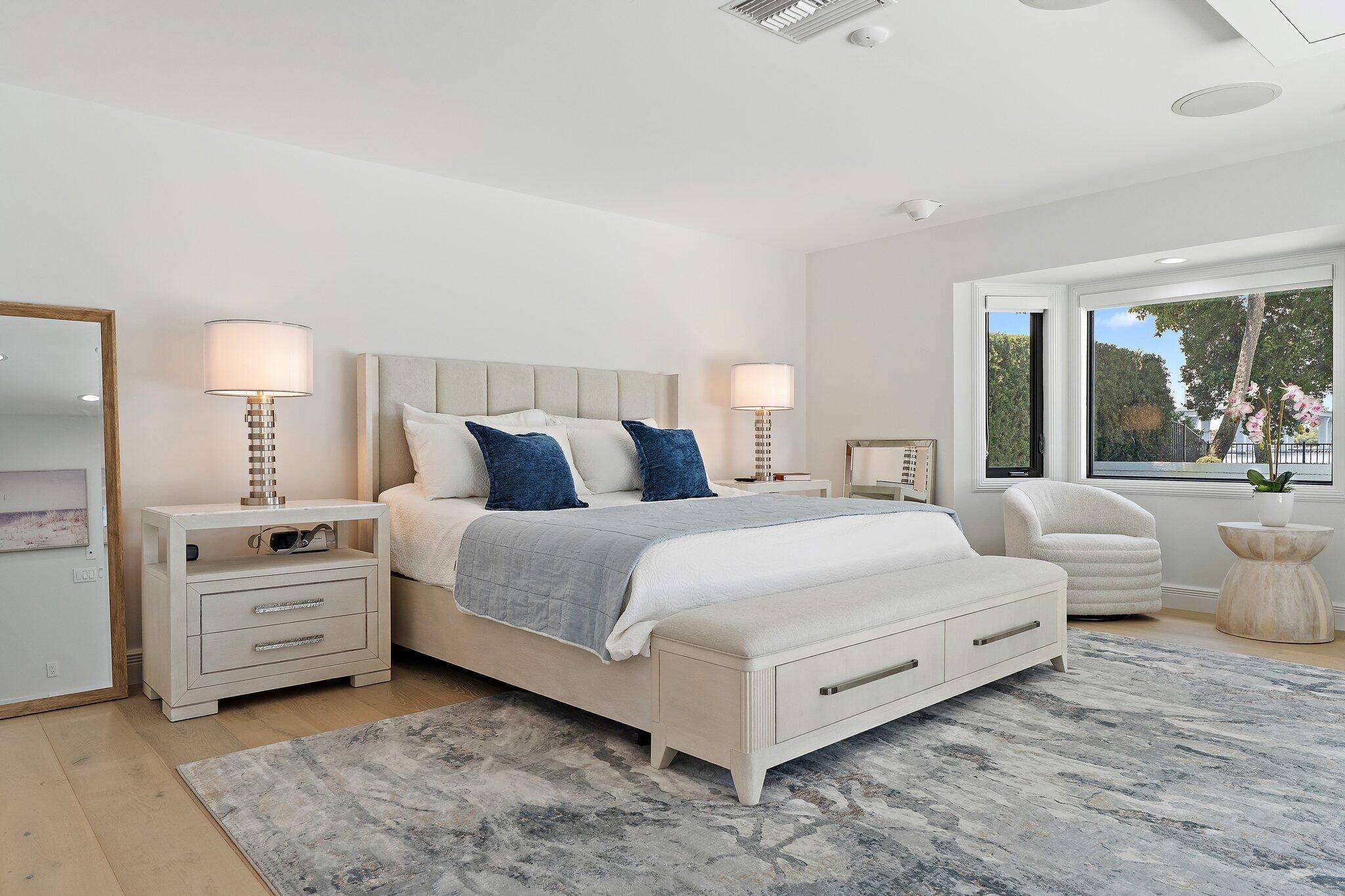 9 North River Road Stuart, FL 34996 - Photo 10 of 24 a bedroom with bed and large window