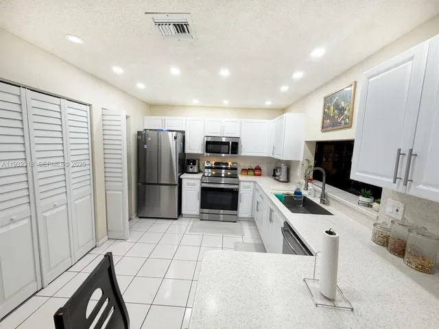 $449,950 | 10877 Northwest 8th Street, Pembroke Pines, FL 33026