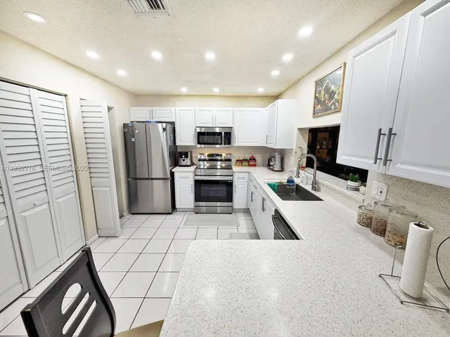 $449,950 | 10877 Northwest 8th Street, Pembroke Pines, FL 33026