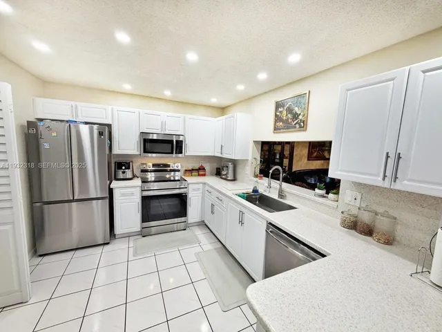 $449,950 | 10877 Northwest 8th Street, Pembroke Pines, FL 33026