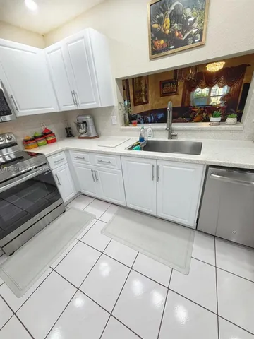 $449,950 | 10877 Northwest 8th Street, Pembroke Pines, FL 33026