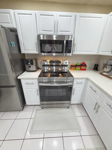 $449,950 | 10877 Northwest 8th Street, Pembroke Pines, FL 33026