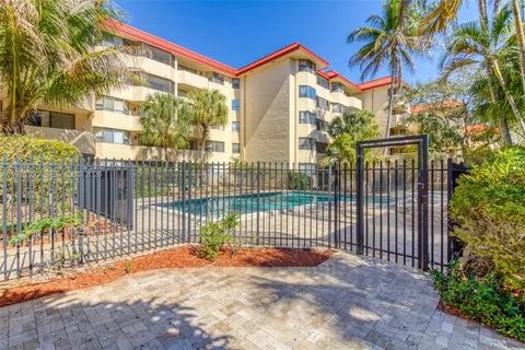 a view of swimming pool with a patio