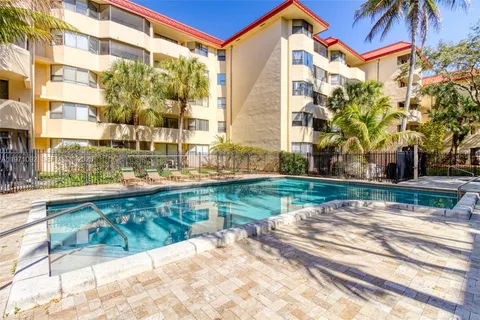 a view of a building with a street
