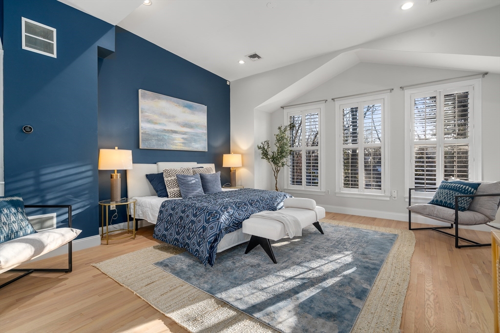 334 Beacon Street, Unit B Somerville, MA 02143 - Photo 11 of 23 a living room with furniture and a large window