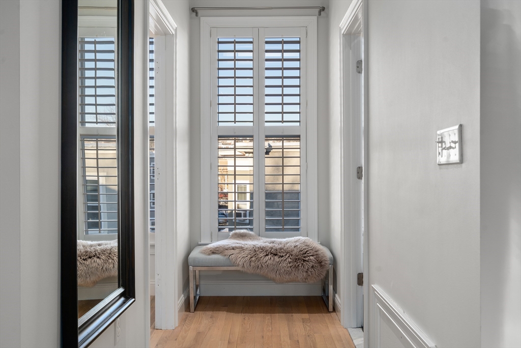 334 Beacon Street, Unit B Somerville, MA 02143 - Photo 14 of 23 a room with a bed and a window