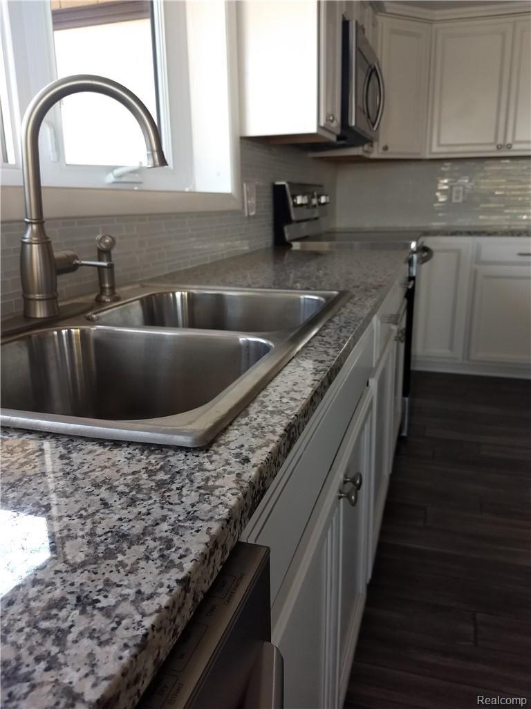 8406 Miller Road Swartz Creek, MI 48473 - Photo 3 of 34 Miller kit d1.jpg