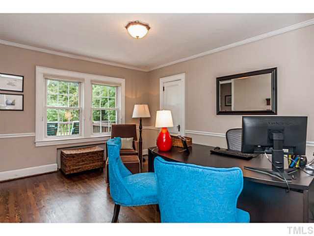 111 North King Charles Road Raleigh, NC 27610 - Photo 13 of 25 a living room with furniture and a window