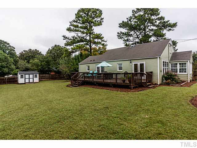 111 North King Charles Road Raleigh, NC 27610 - Photo 24 of 25 a view of a house with a big yard plants and large trees