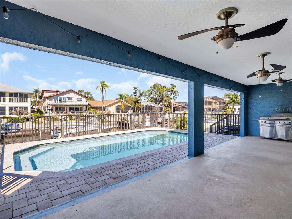 6241 Bayside Drive New Port Richey, FL 34652 - Photo 45 of 78 a view of a living room and floor to ceiling window