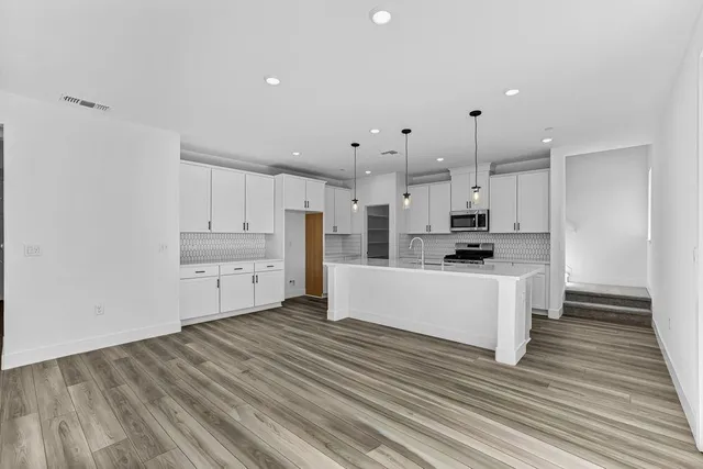 a view of an empty walk in closet