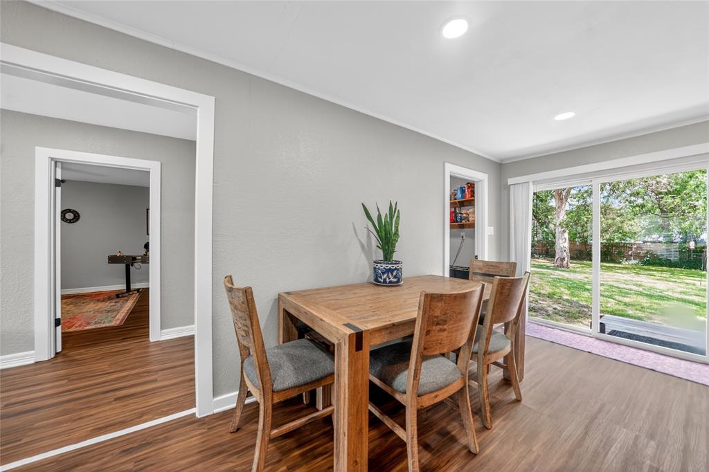 614 Colonial Drive Athens, TX 75751 - Photo 11 of 26 a view of a dining room with furniture and wooden floor