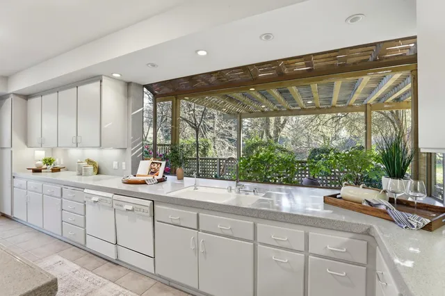 a workspace with furniture and a window