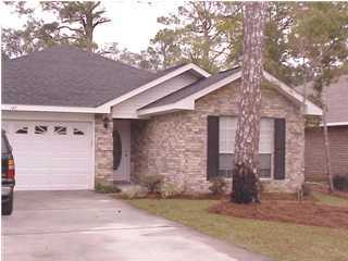142 Bayou Landing Road Miramar Beach, FL 32550 - Photo 1 of 1 a front view of a house with a yard and garage