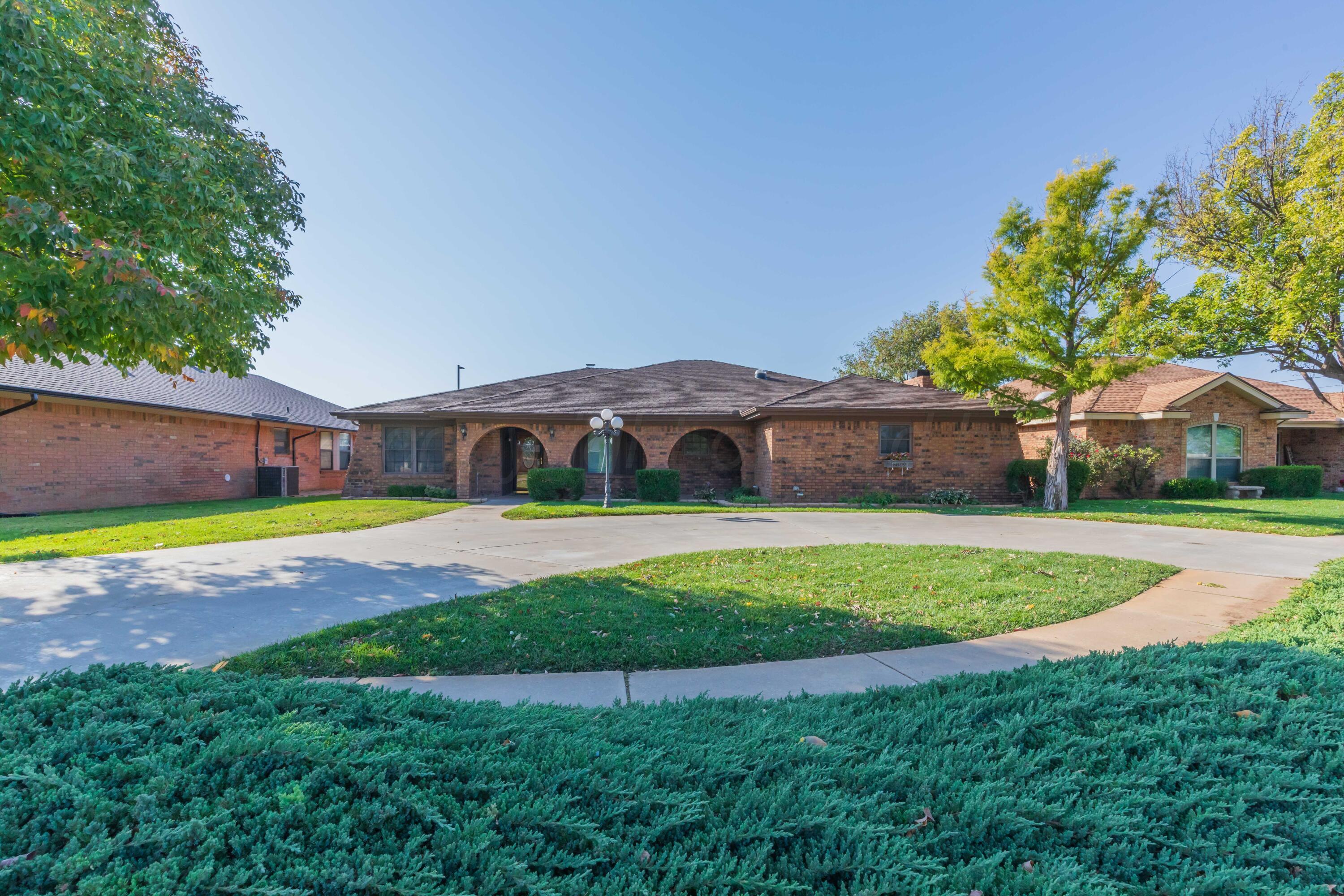 5809 Stone Drive Amarillo, TX 79109 - Photo 4 of 47 a front view of house with yard and outdoor seating