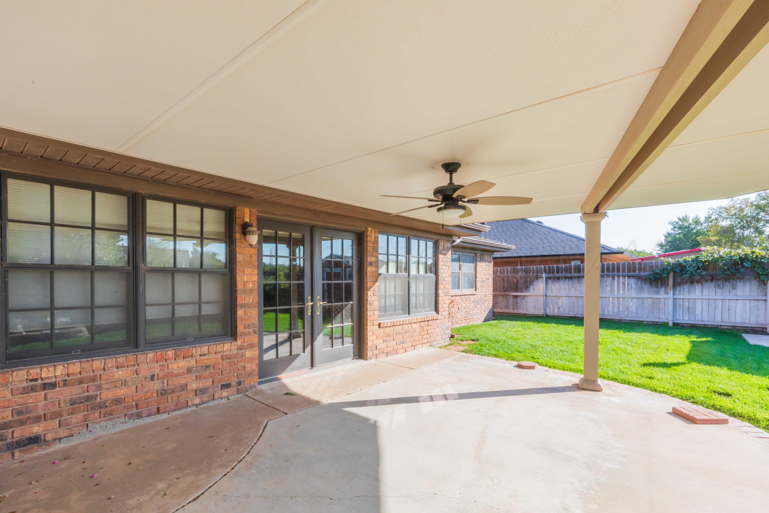 5809 Stone Drive Amarillo, TX 79109 - Photo 42 of 47 a view of a house with a yard and porch