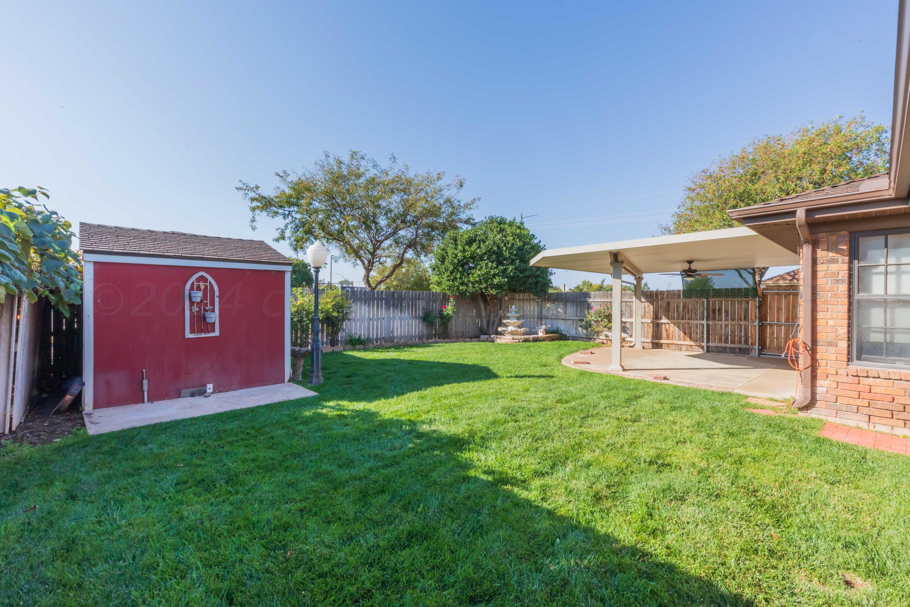 5809 Stone Drive Amarillo, TX 79109 - Photo 46 of 47 a view of a house with backyard and sitting area
