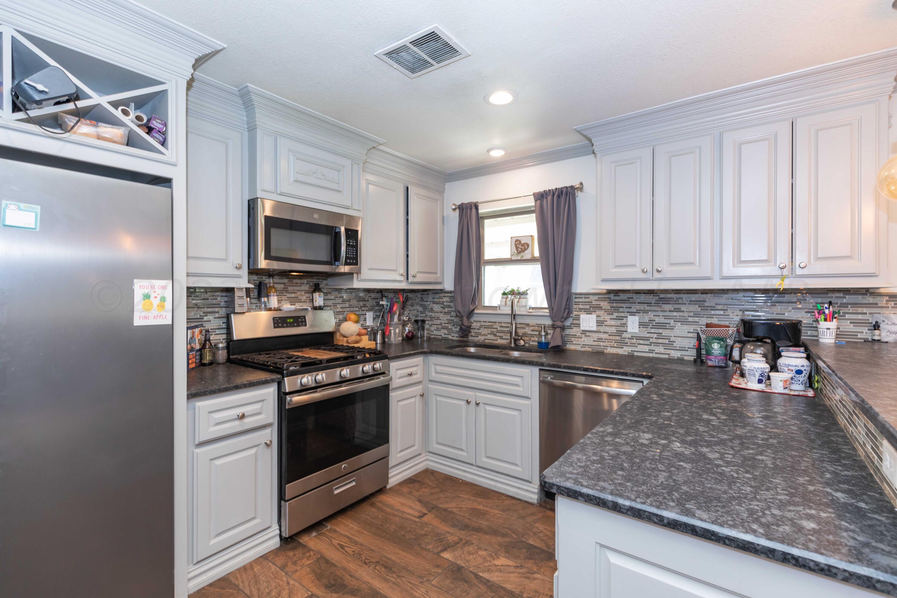5107 Shield Drive Amarillo, TX 79110 - Photo 13 of 40 KITCHEN VIEW 1