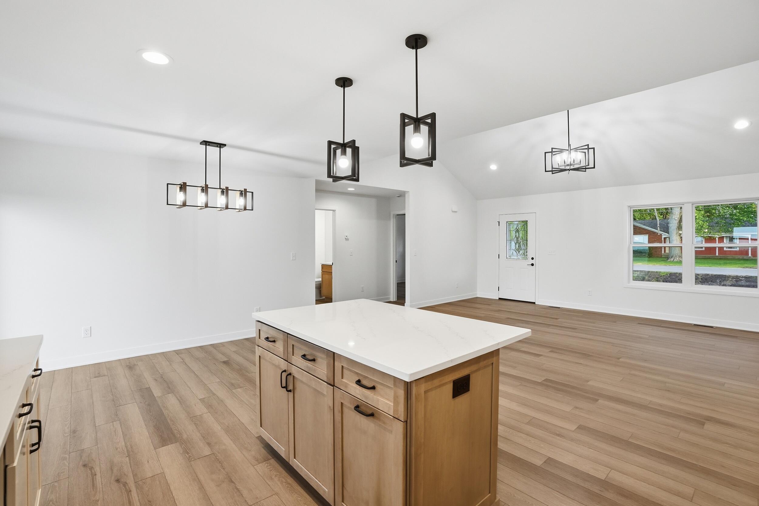 508 West Beaver Street Morocco, IN 47963 - Photo 13 of 33 a view of a kitchen and wooden floor